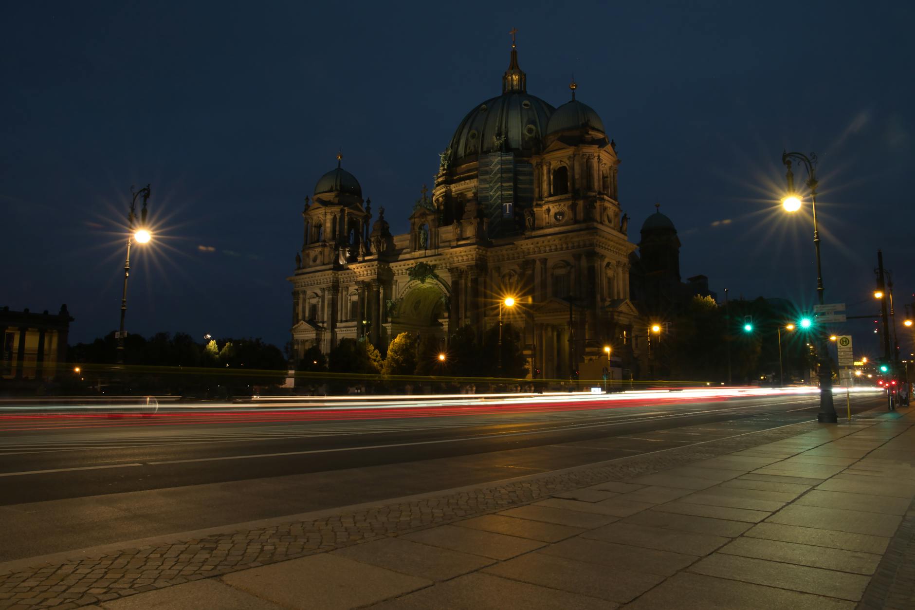 Berlin city illuminated at night with transportation lights