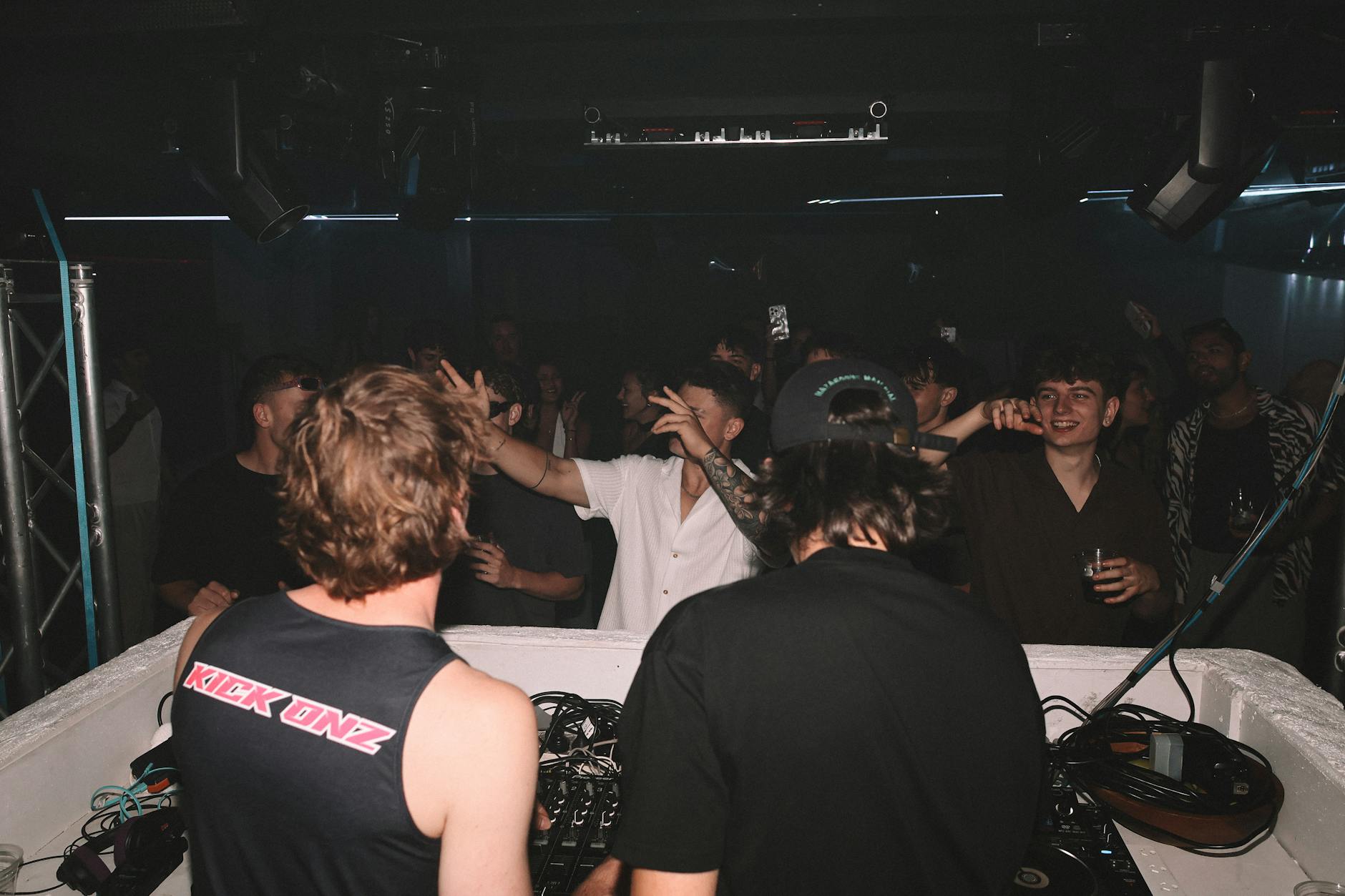 Dark interior of a Berlin techno club with industrial aesthetic