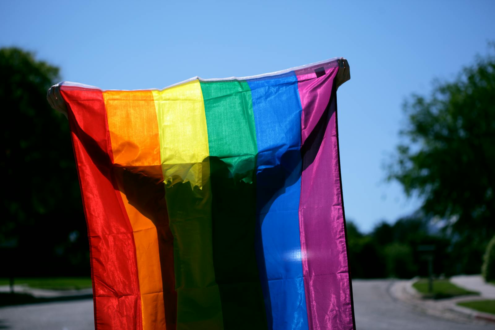 Bright rainbow LGBTQ pride flag outdoors