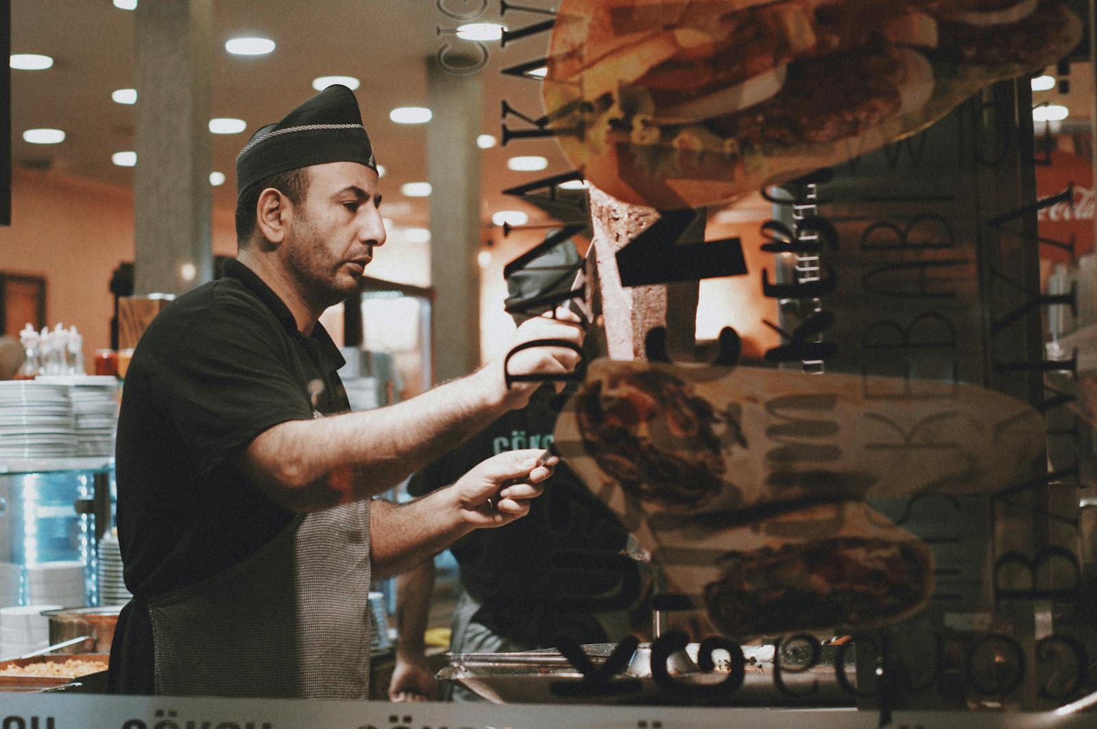 Chef preparing doner kebab in Berlin restaurant