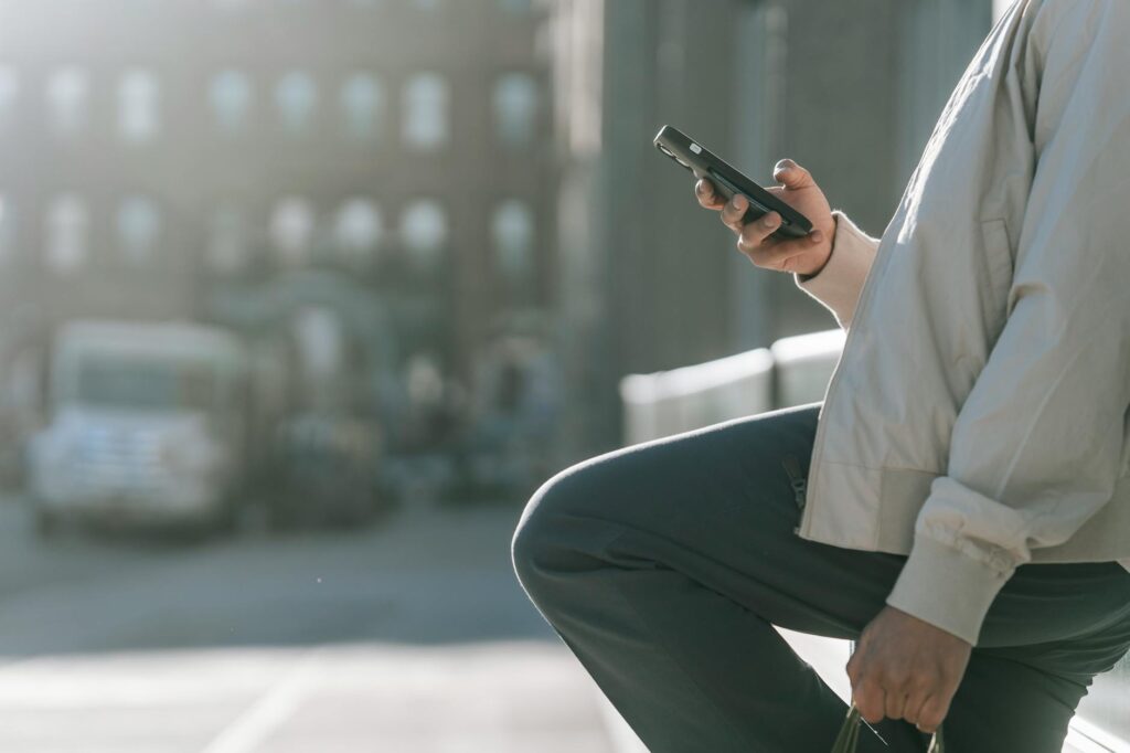 Person using smartphone in Berlin