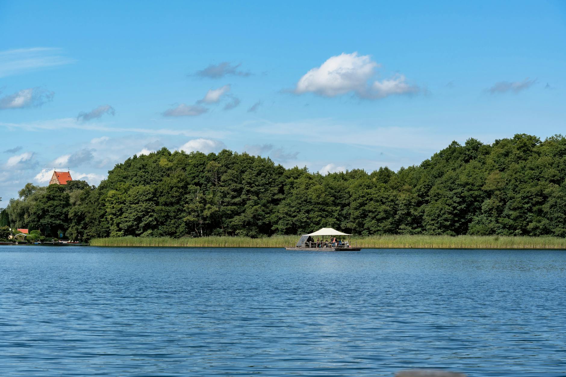 Brandenburg countryside with lake forest and clear sky outside Berlin