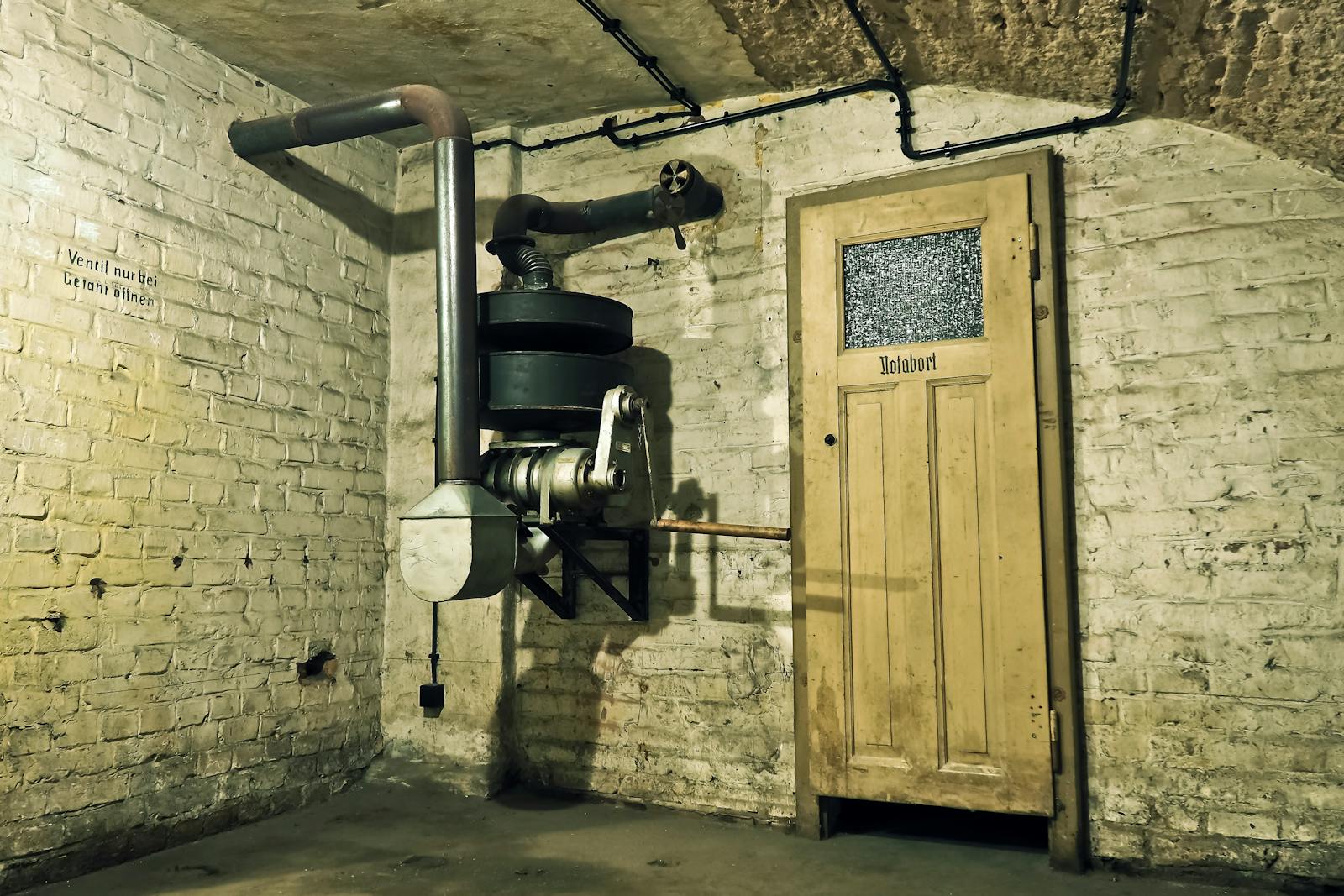 Abandoned WWII air raid shelter bunker with vintage machinery in Berlin