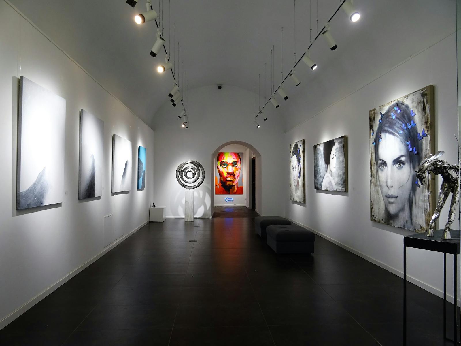 Modern art gallery with contemporary paintings on display