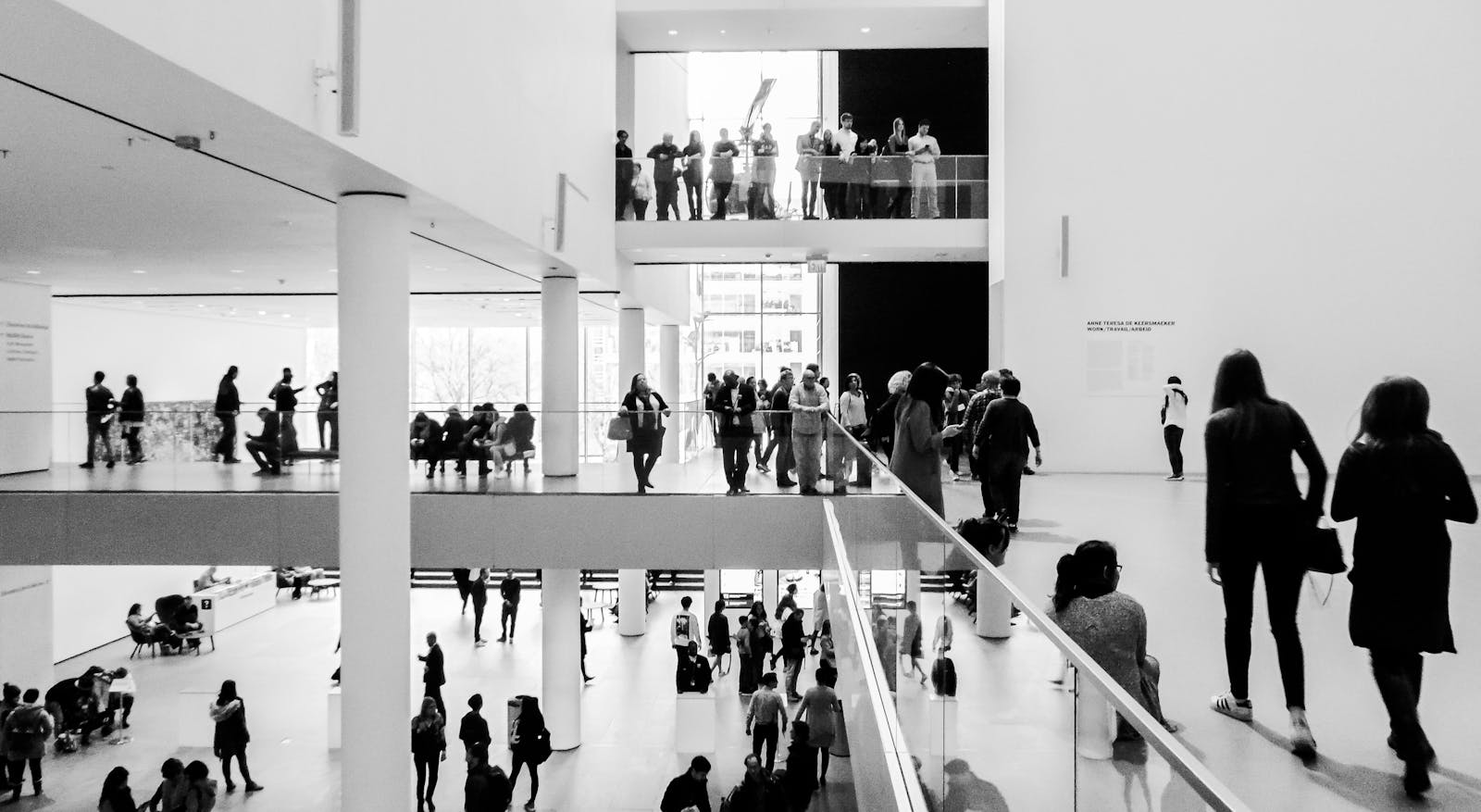 Visitors in a modern contemporary art museum interior