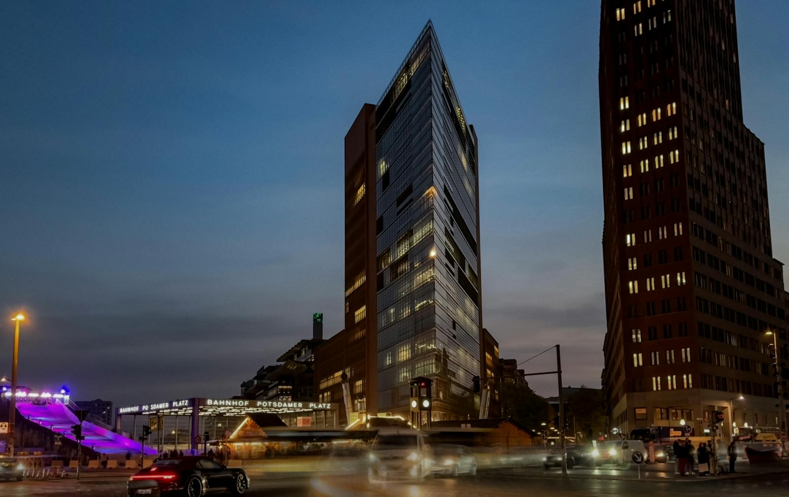 Potsdamer Platz at night in Berlin with modern skyscrapers and light trails
