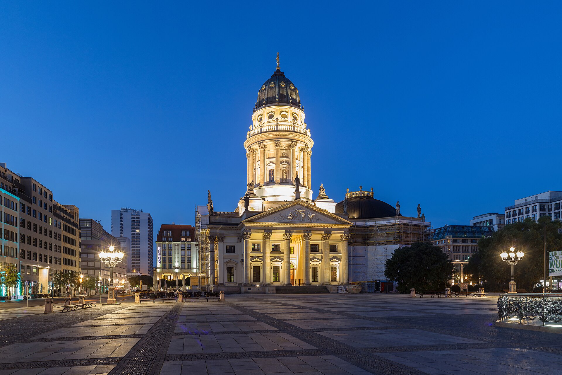 The Deutscher Dom lit at dusk at the south end of Gendarmenmarkt in Berlin