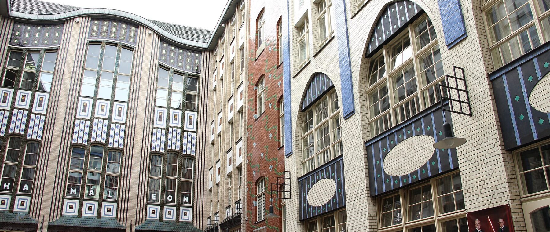 The tiled Art Nouveau facades of the first courtyard of the Hackesche Höfe in Berlin Mitte