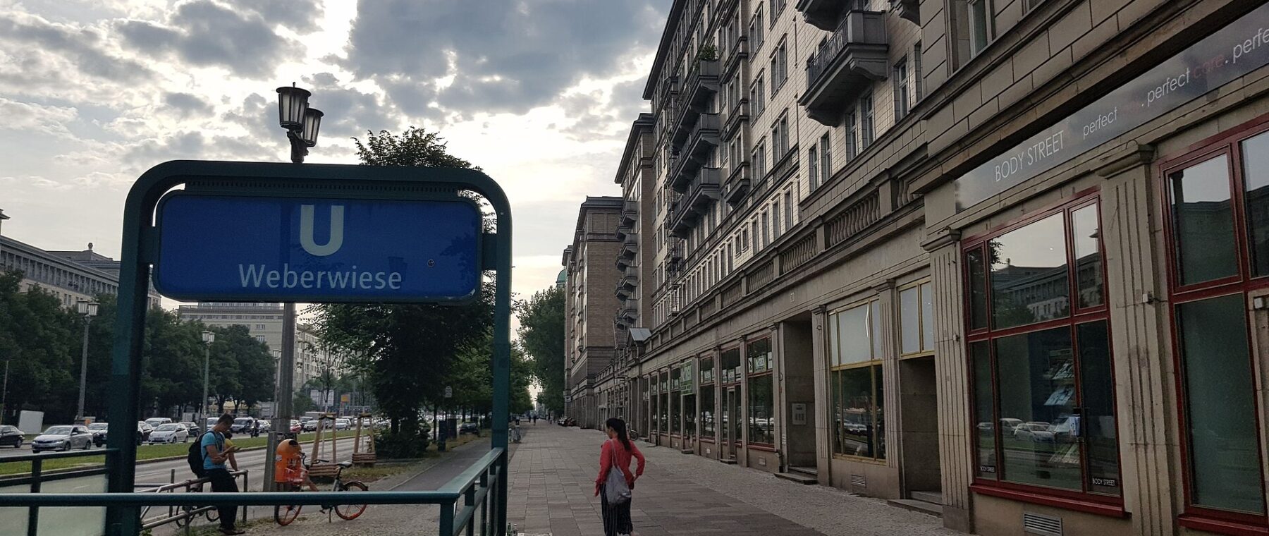 Tiled apartment blocks and colonnades along Karl-Marx-Allee at Weberwiese in Berlin