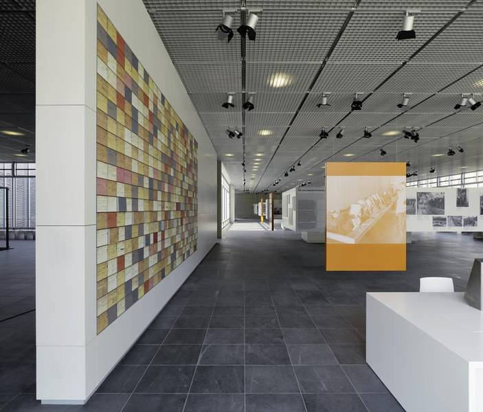 The main exhibition hall of the Topography of Terror documentation centre in Berlin with wall panels and display cases